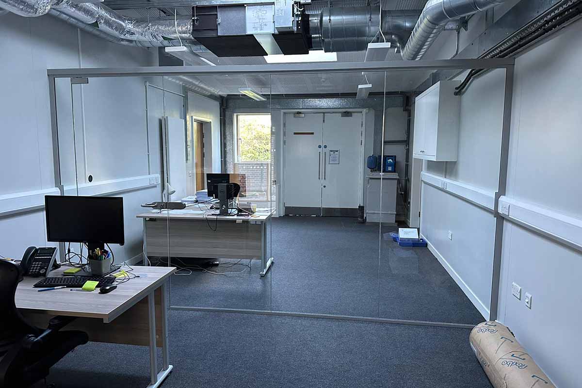 Glass Partitioning Installation On New Carpets